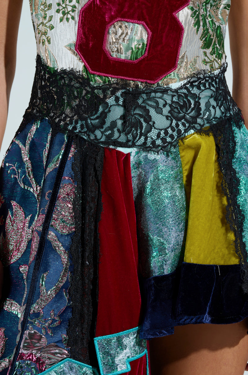 CLEAT CHASER LAYERED JERSEY HIGH LOW DRESS IN BROCADE